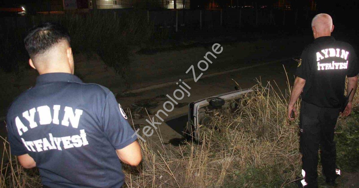 "Aydın'da Kontrolü Kaybolan Otomobil Kanala Uçtu: 2 Kişi Yaralandı" başlıklı haber için fotorealisti