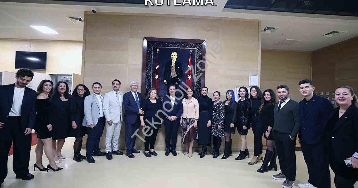 "Muğla Belediyesinden Öğretmenlere Anlamlı Kutlama" başlıklı haber için fotorealistik, profesyonel b