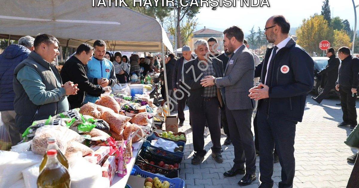 "Tavas'ta Gazze İçin Gönül Köprüsü: Başkan Tatık Hayır Çarşısı'nda" başlıklı haber için fotorealisti